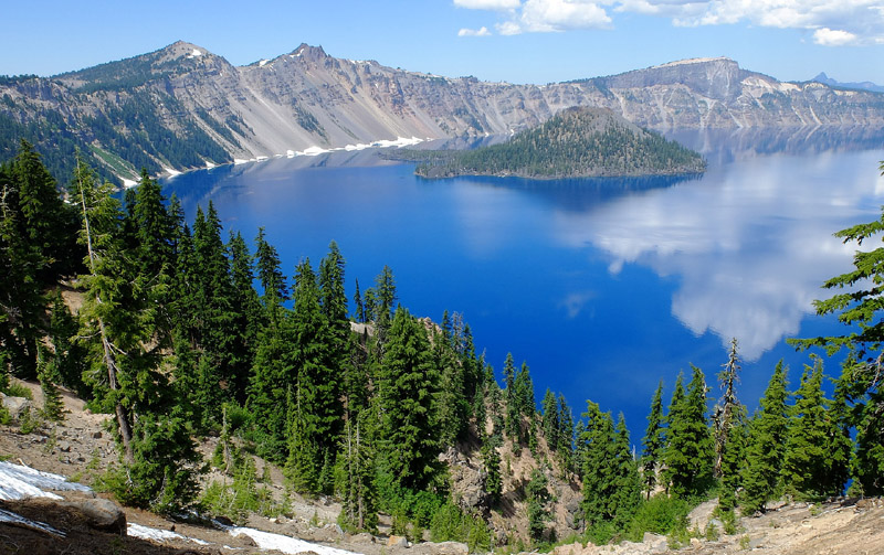 Summer panoramic view of Crater Lake and its turquoise waters